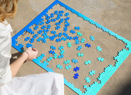 Girl playing puzzles